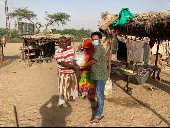Relief distribution in progress in rural Rajasthan.